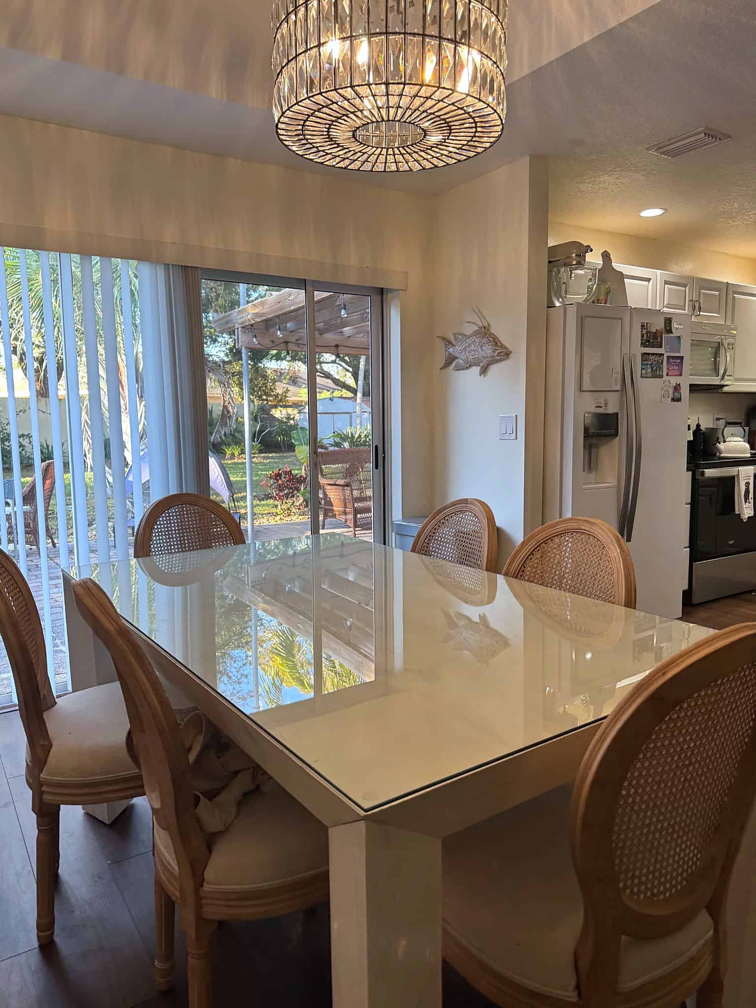 Rectangular custom glass top on a white dining table, installed by All Glass 4 U