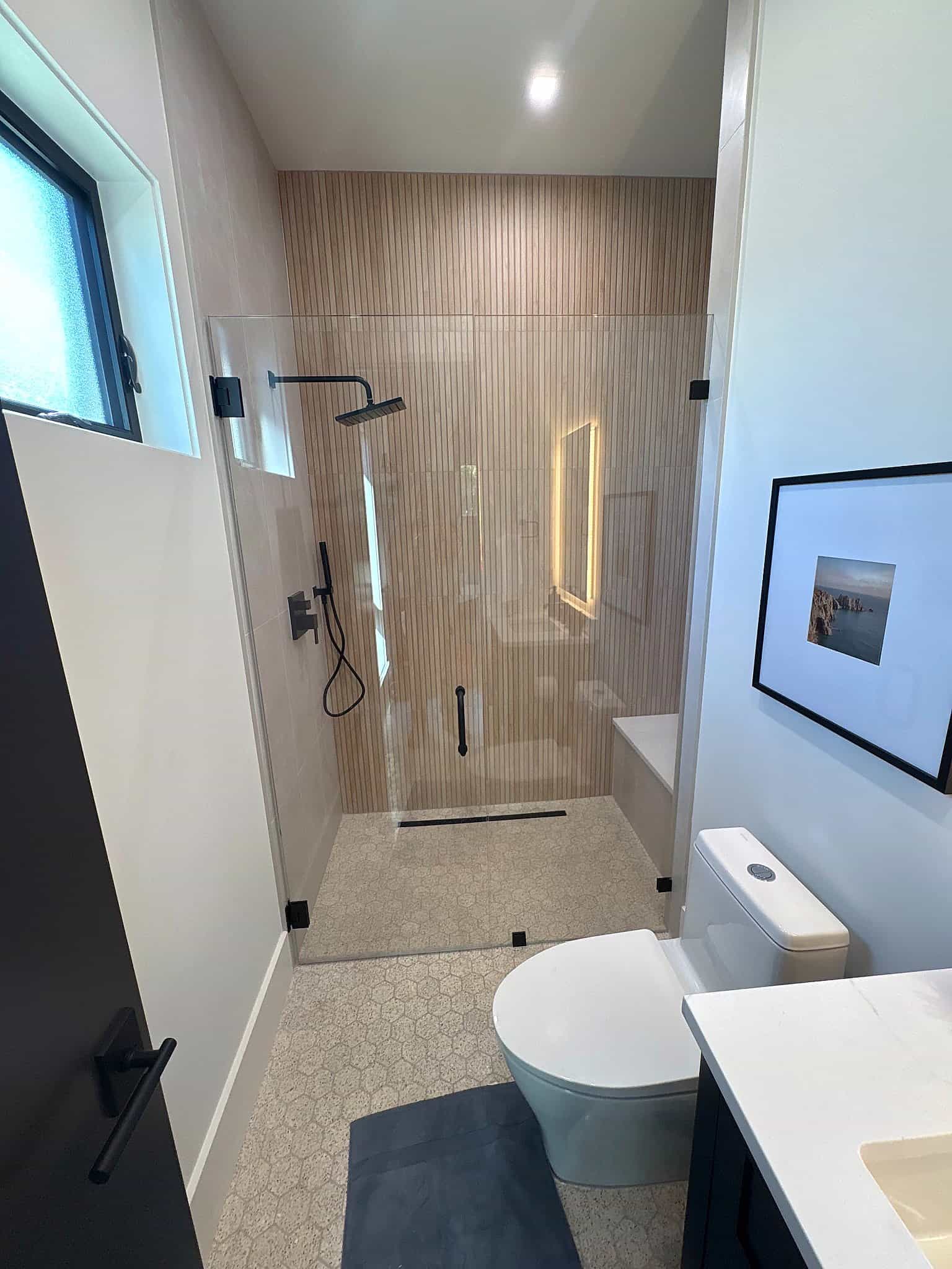 Custom frameless shower door installation in Boca Raton, FL
